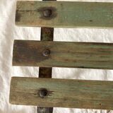 Low stool with wooden and metal slats