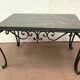 Table basse en fer forgé et marbre XX siècle
