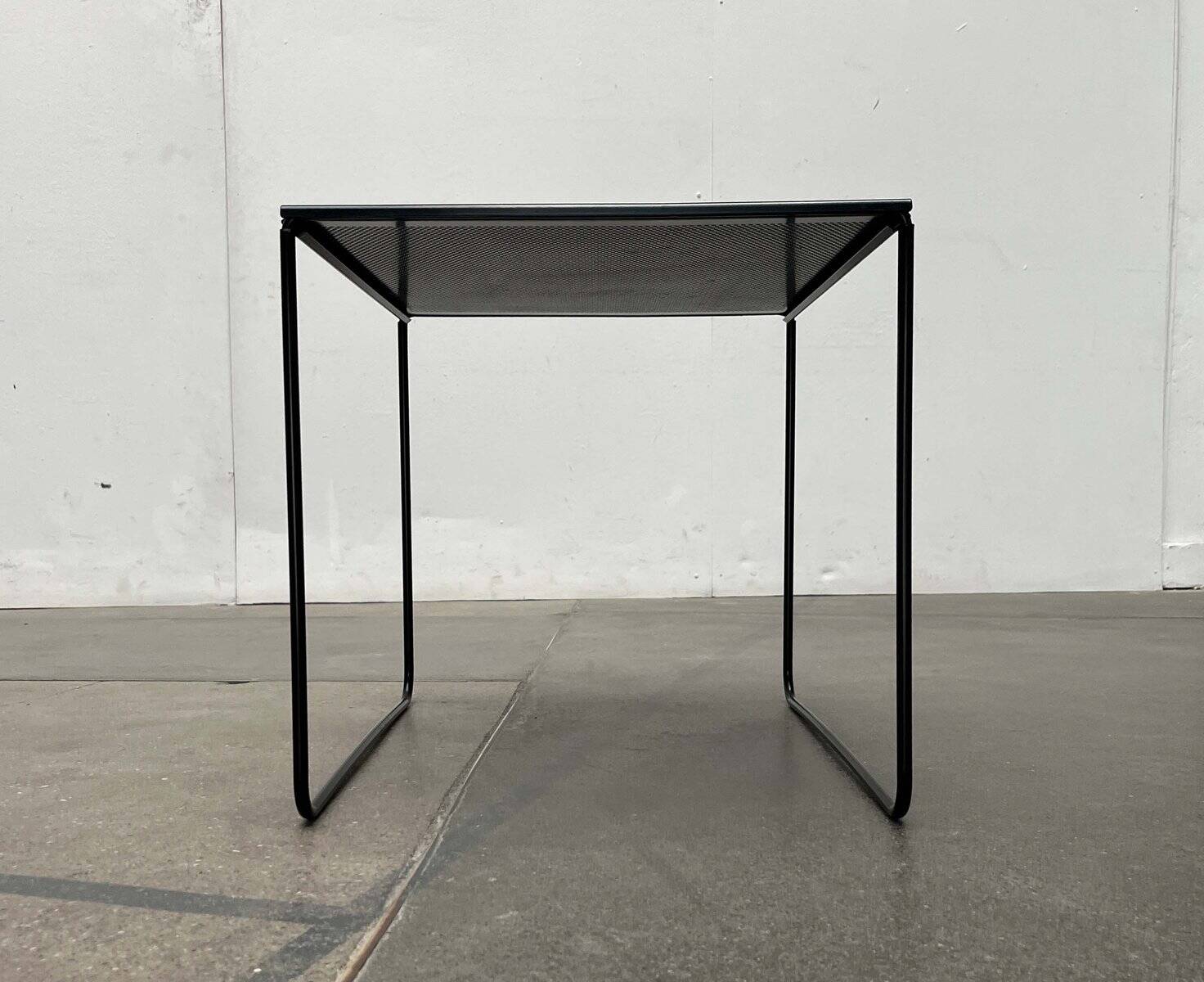 Postmodern perforated metal nesting side table from Ikea, 1980s.