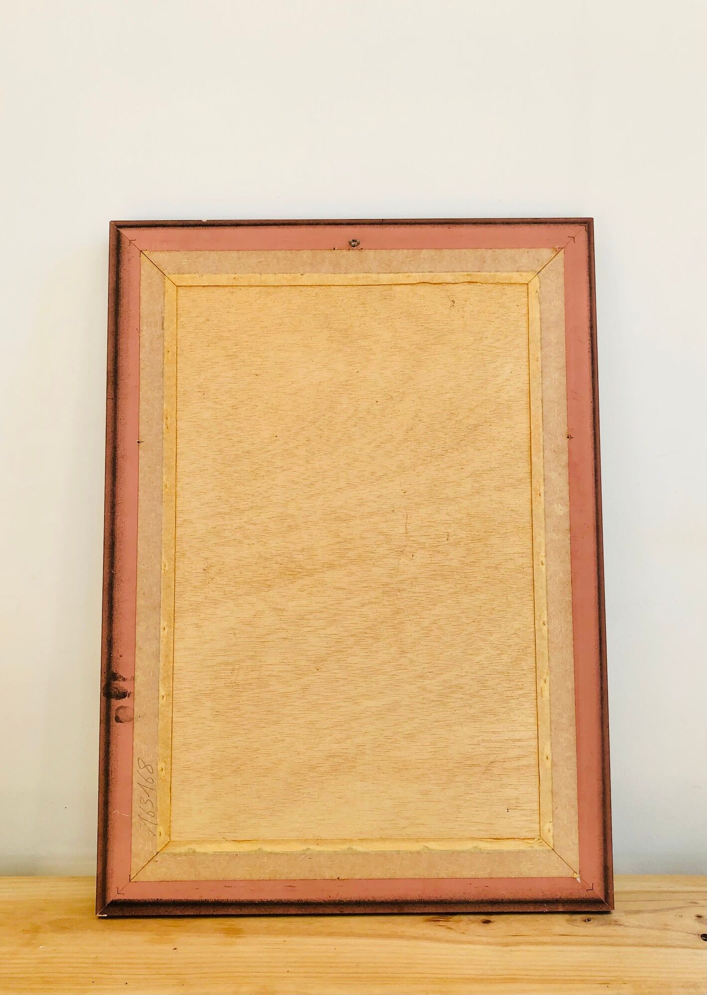 Old wall mirror 72 x 52 cm in black wood and faux mahogany