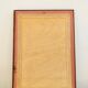 Old wall mirror 72 x 52 cm in black wood and faux mahogany
