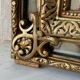 Miroir antique doré à parclose aux dragons, 119x75 cm