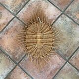 Sun mirror in woven rattan. 1960. Diamond.