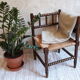 Fauteuil de coin paillé