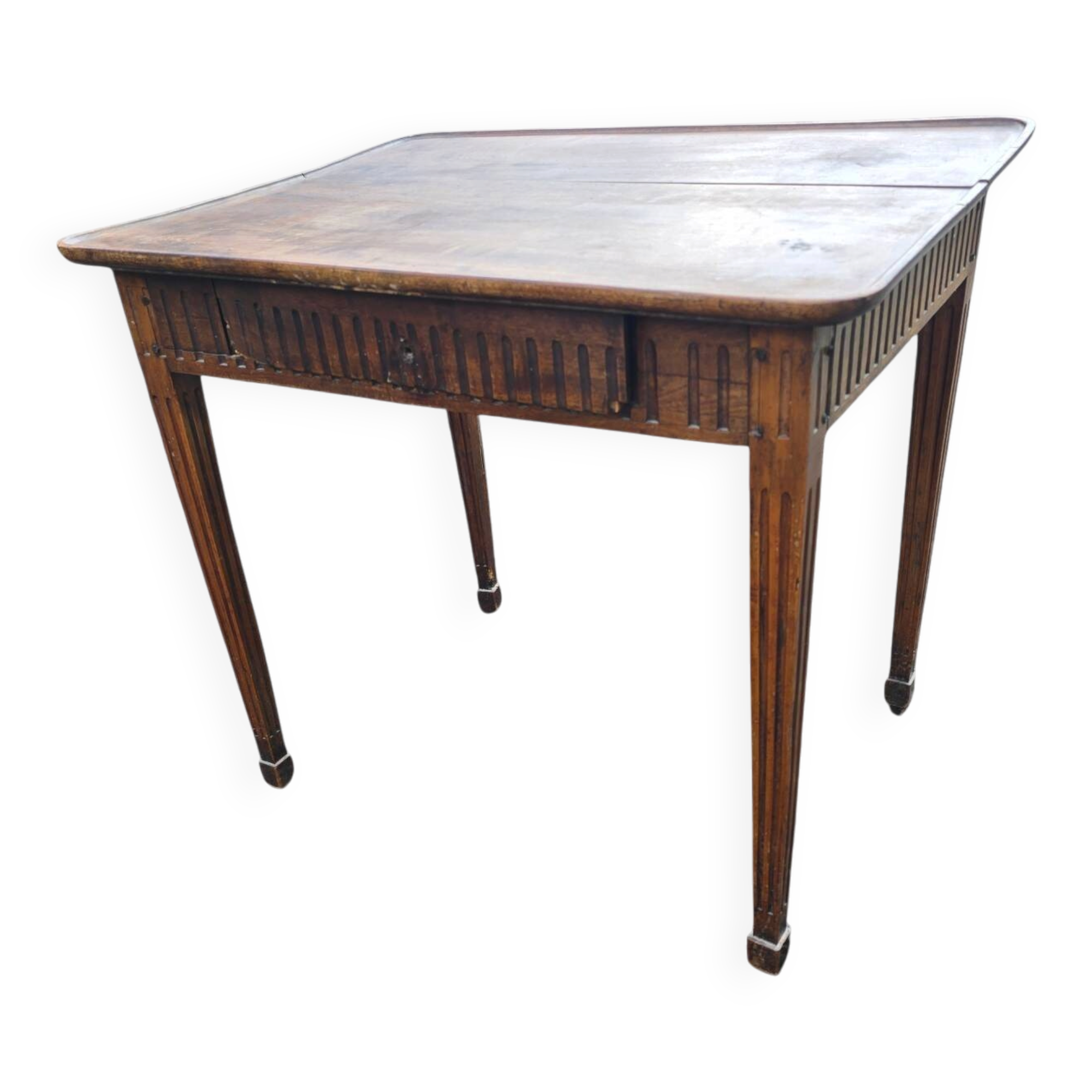 Antique game table in patinated wood in the Louis XVI style.