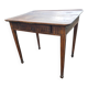 Antique game table in patinated wood in the Louis XVI style.