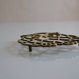Vintage openwork brass trivet in the shape of an owl or owl