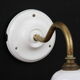 Brass, porcelain, opaline glass tulip swan neck wall lamp