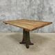 Antique oak dining table on cast iron base 93 x 123 cm