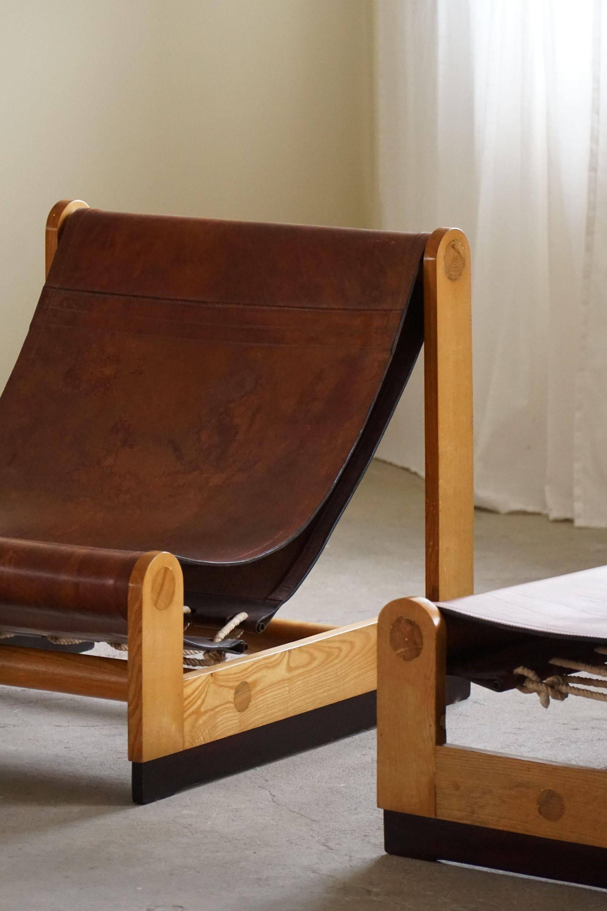 Francesco Lucianetti, Lounge chairs in leather and elm, Italian modern, 1960s