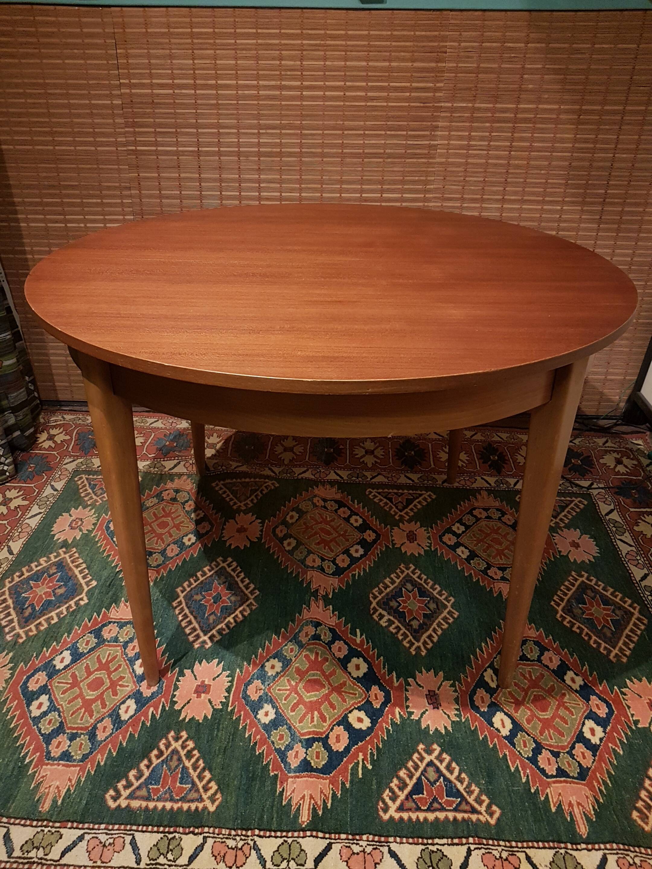Scandinavian round extending table.