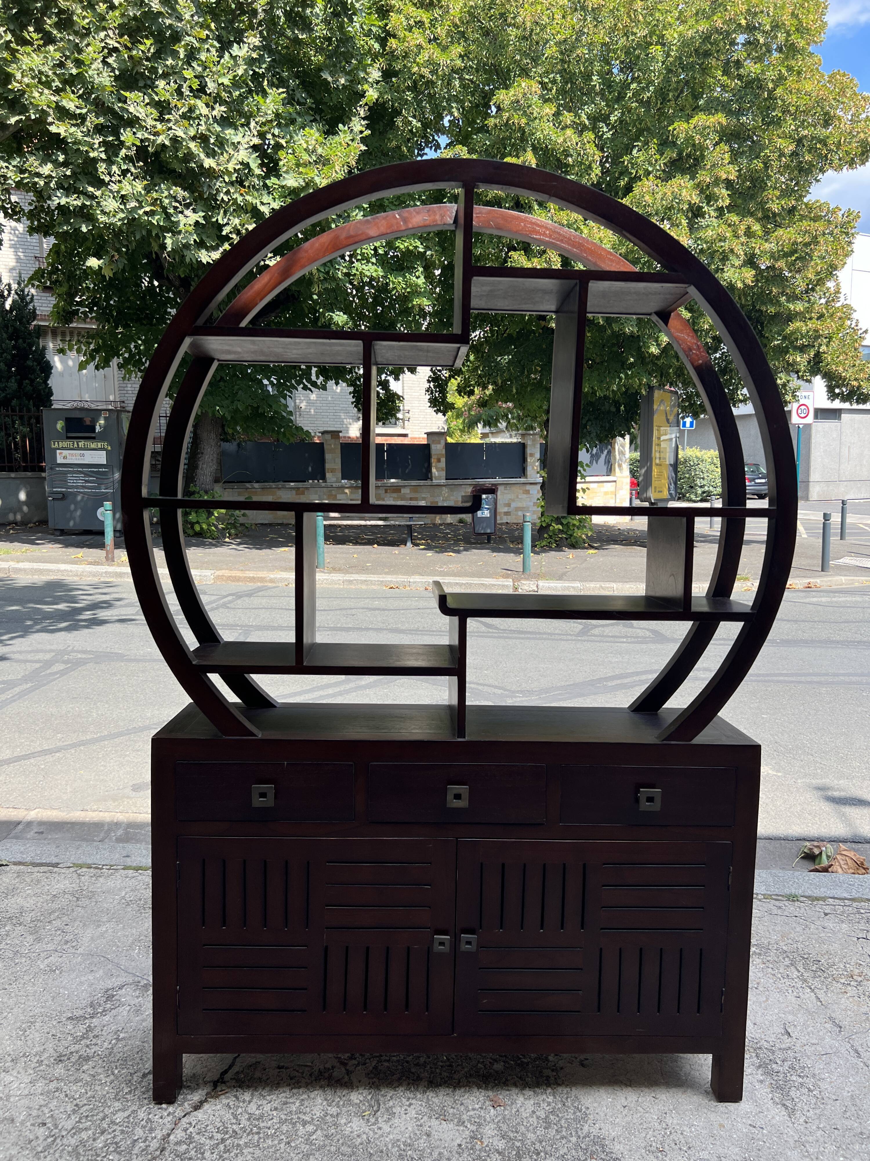 Round galay shelf on bahut sideboard