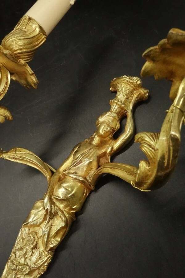 Pair of large caryatid wall sconces in Louis XV style from the 19th century - gilded bronze.