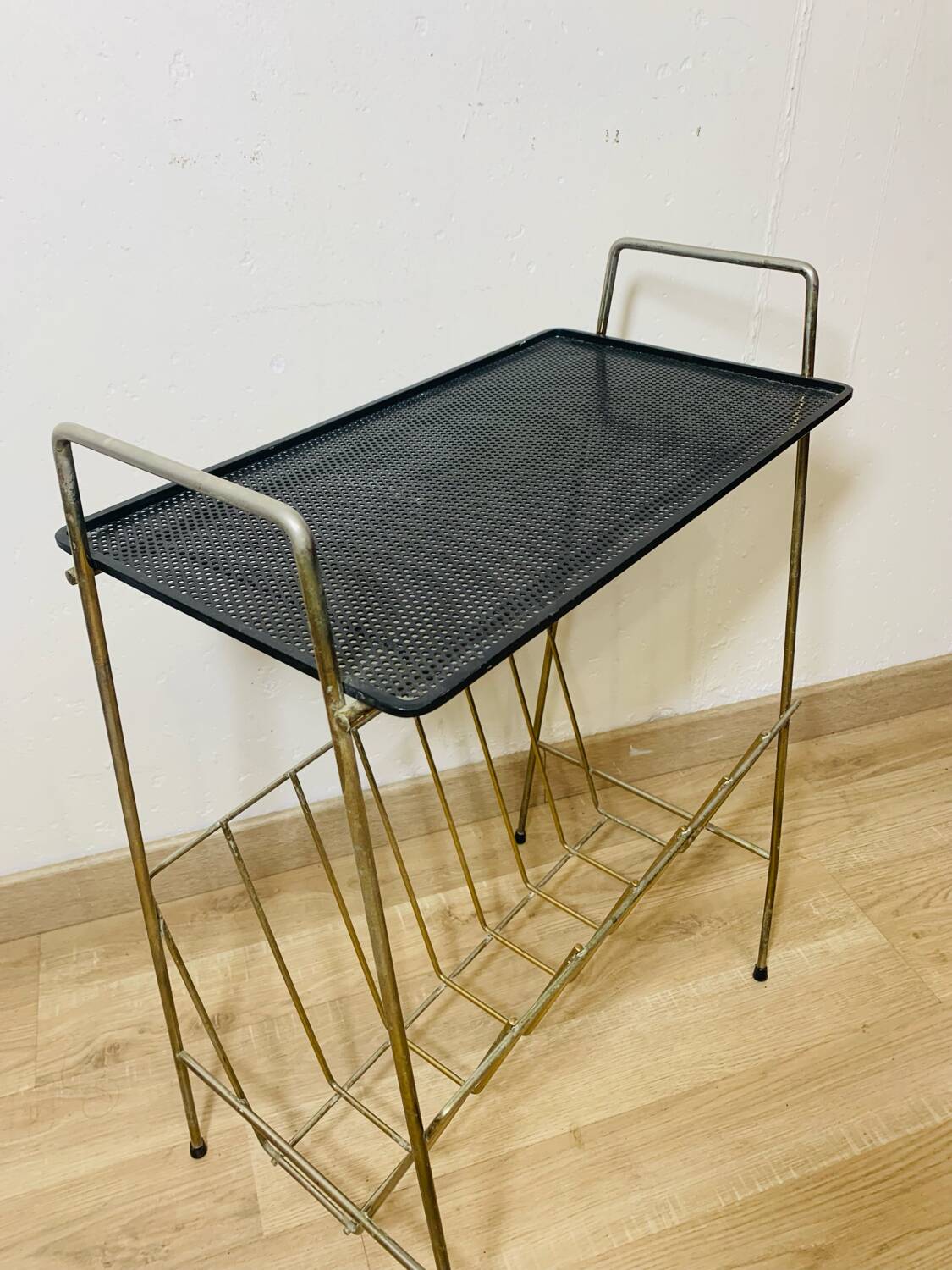 Perforated metal magazine rack