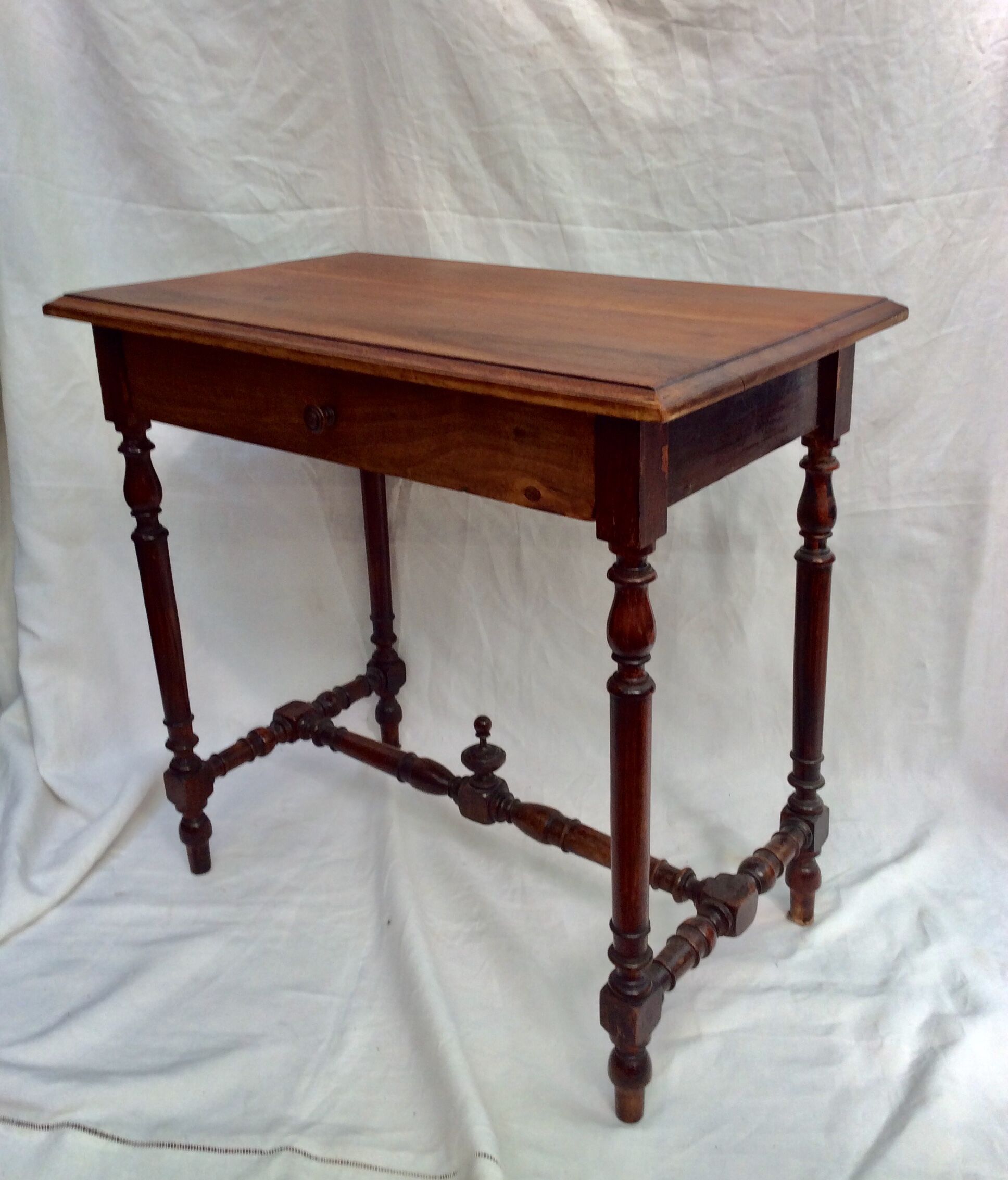 Old wooden table with drawer