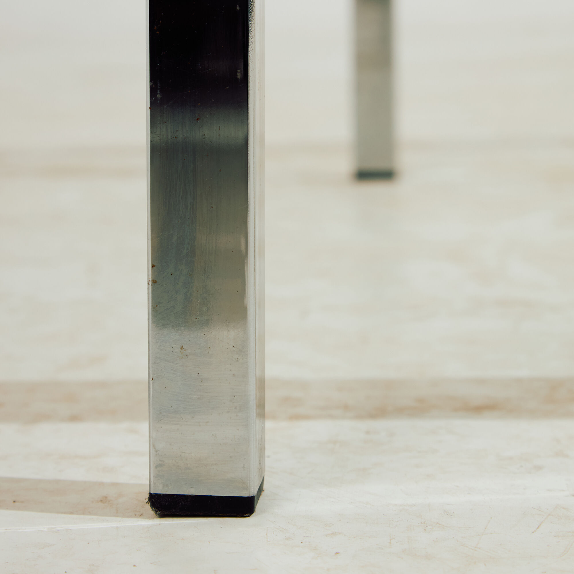 Chrome and glass coffee table.
