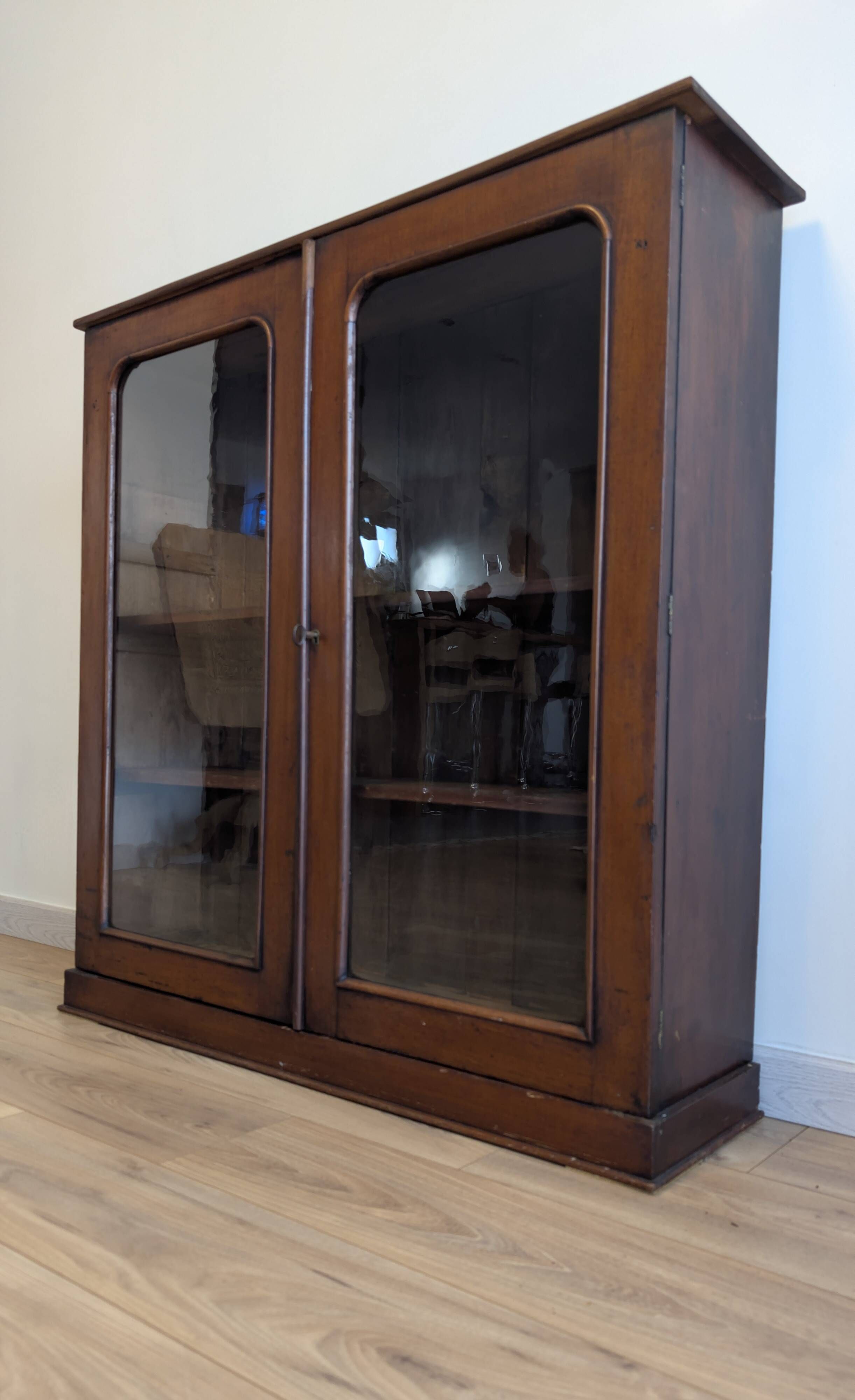 Victorian English mahogany display cabinet, elegant showcase furniture.