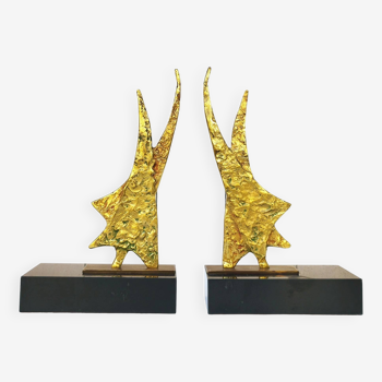 Golden bronze bookends brutalist design