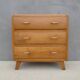 commode vintage en bois pieds compas