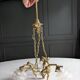 Vintage chandelier with cherubs and frosted glass flowers.