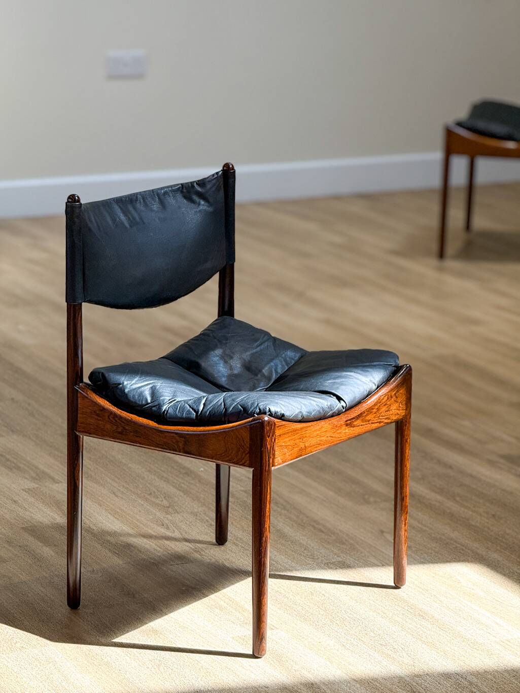 Extendable dining room table and chairs (by Kristian Solmer Vedel)