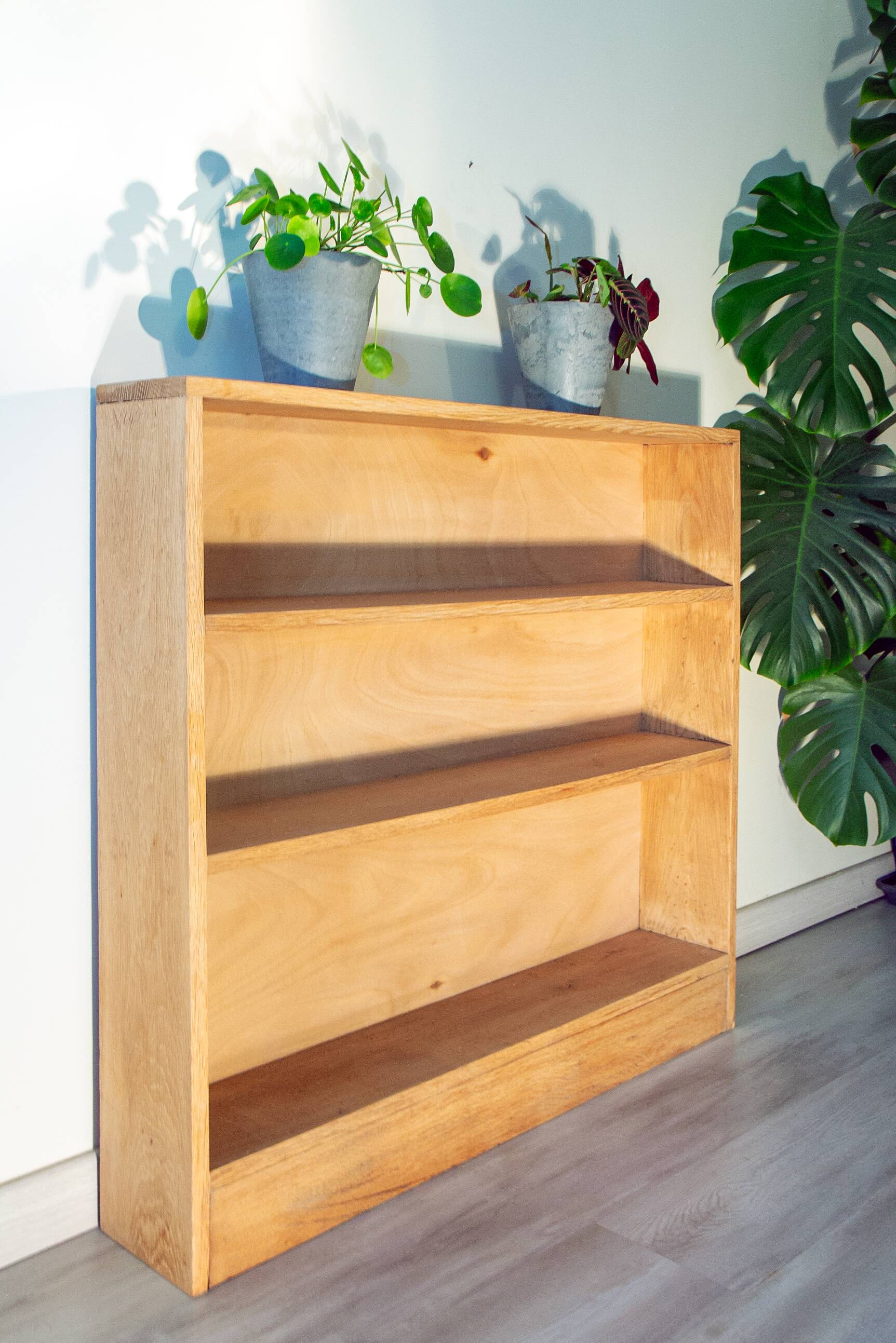 Bookshelf in light, raw solid oak from the 1950s.