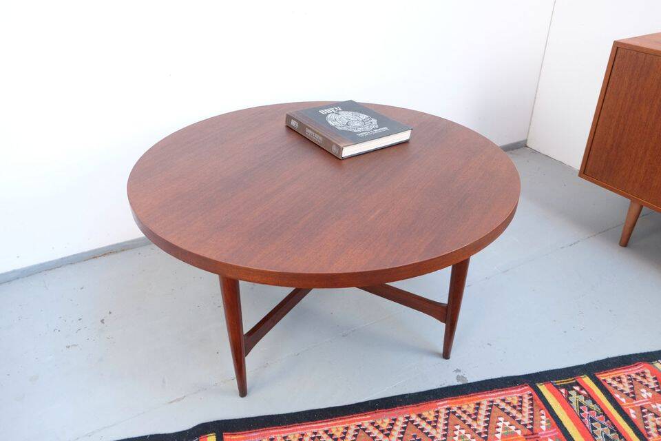 Vintage teak coffee table in 60s-70s style, retro style.
