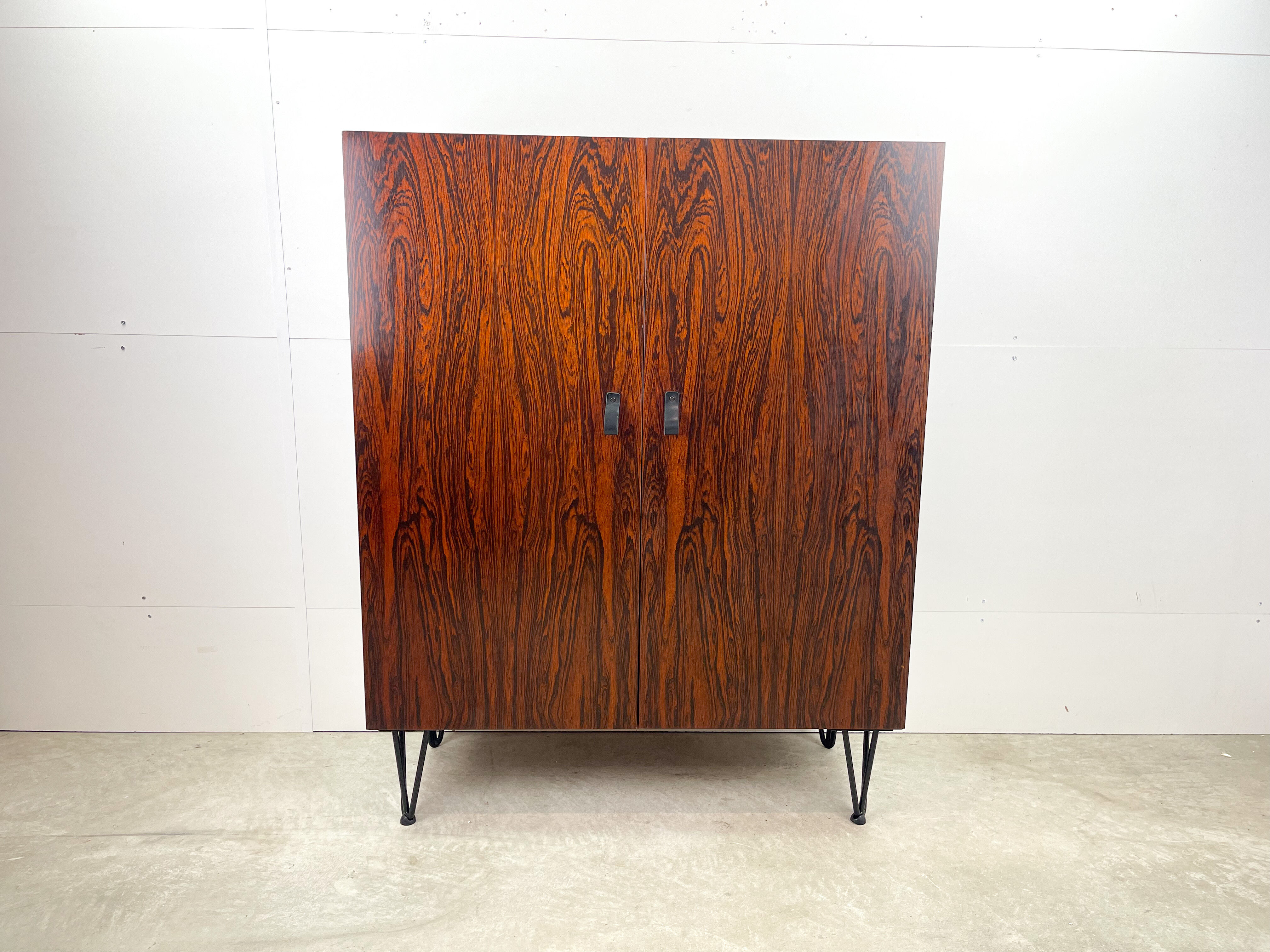 Rosewood cabinet with hairpin legs