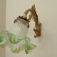 Bronze wall lamp with green tulip