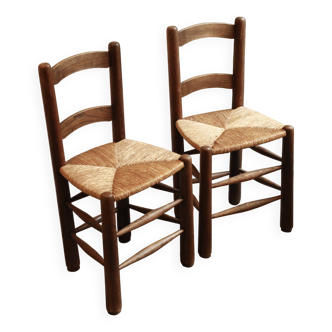 Paire de chaises en bois, assise en paille tressée