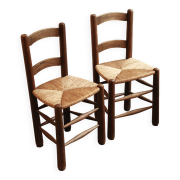 Paire de chaises en bois, assise en paille tressée
