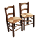 Pair of wooden chairs with woven straw seats.
