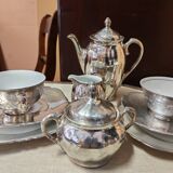 Breakfast set with tea or coffee in porcelain.