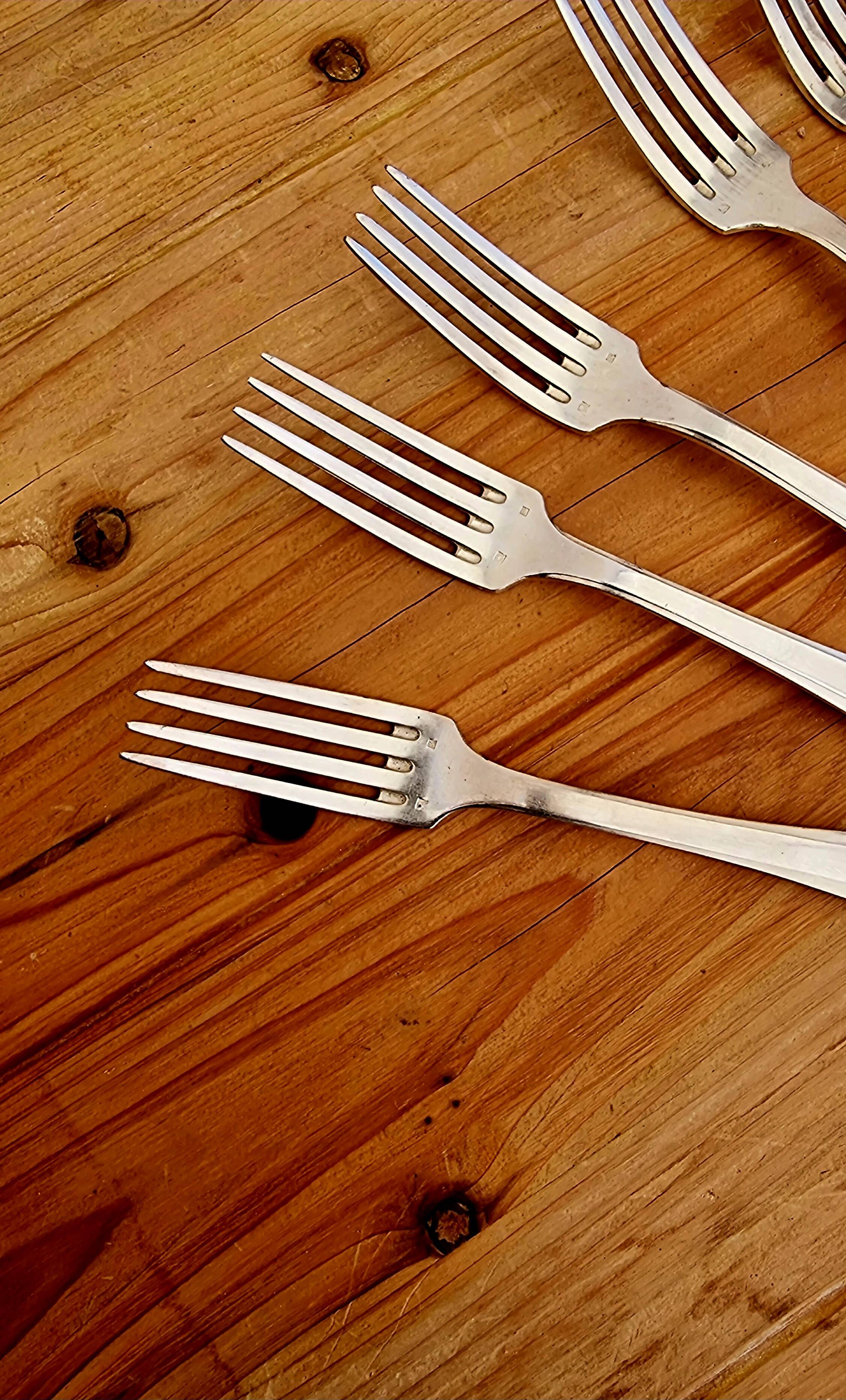 Set of 11 Art Deco silver-plated forks and spoons