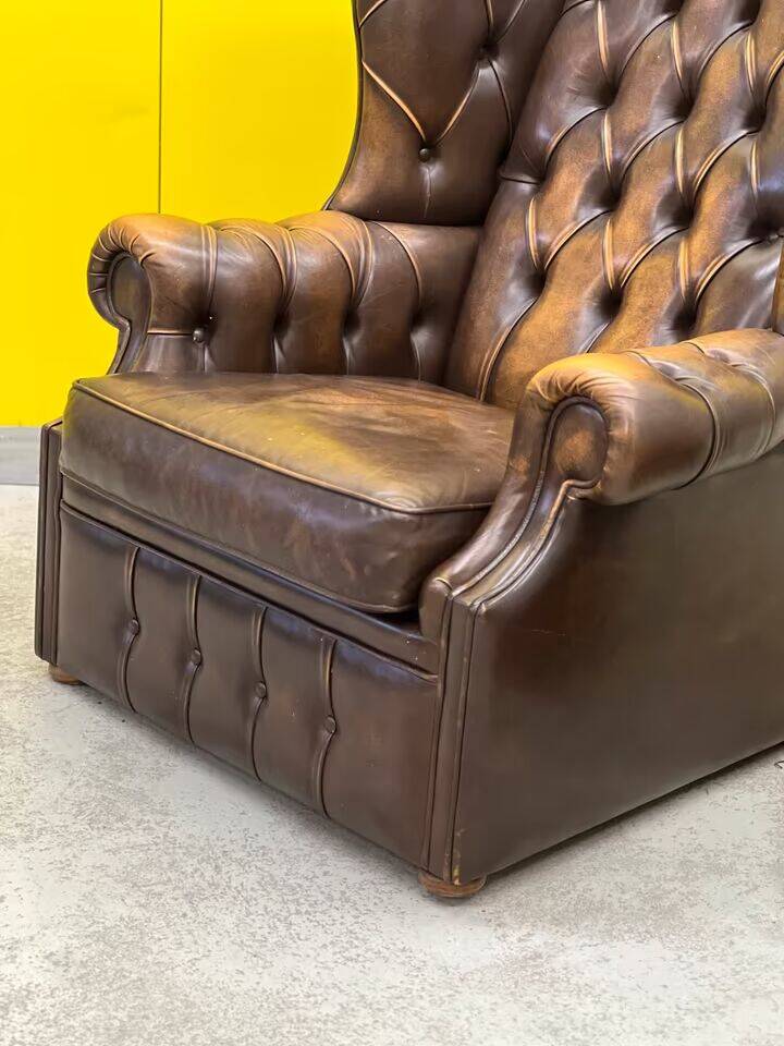 Brown leather chesterfield wing chair with Ottoman
