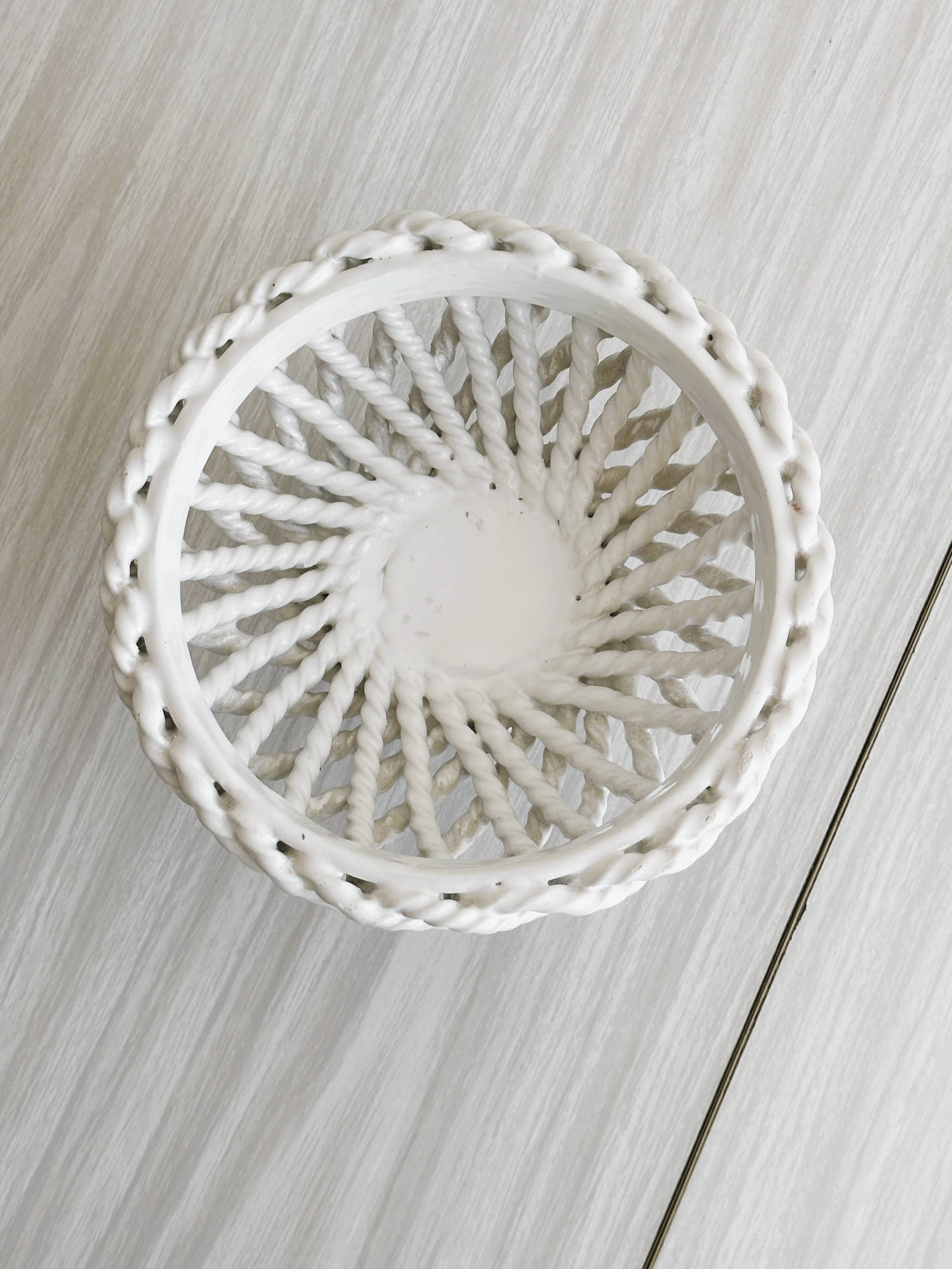 Openwork white porcelain bowl