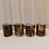 Set of 4 coffee cups and saucers