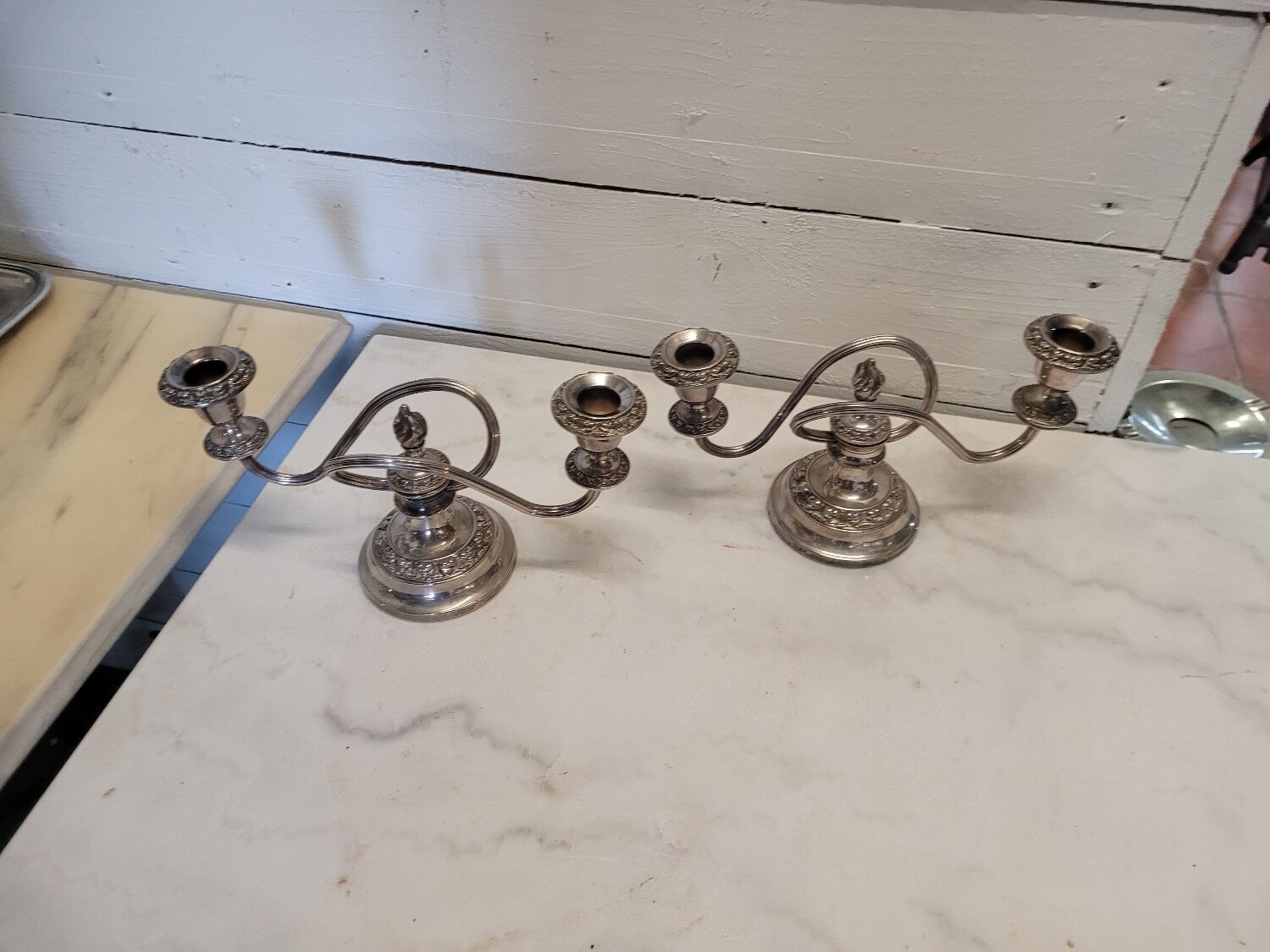 Pair of silver metal candlesticks
