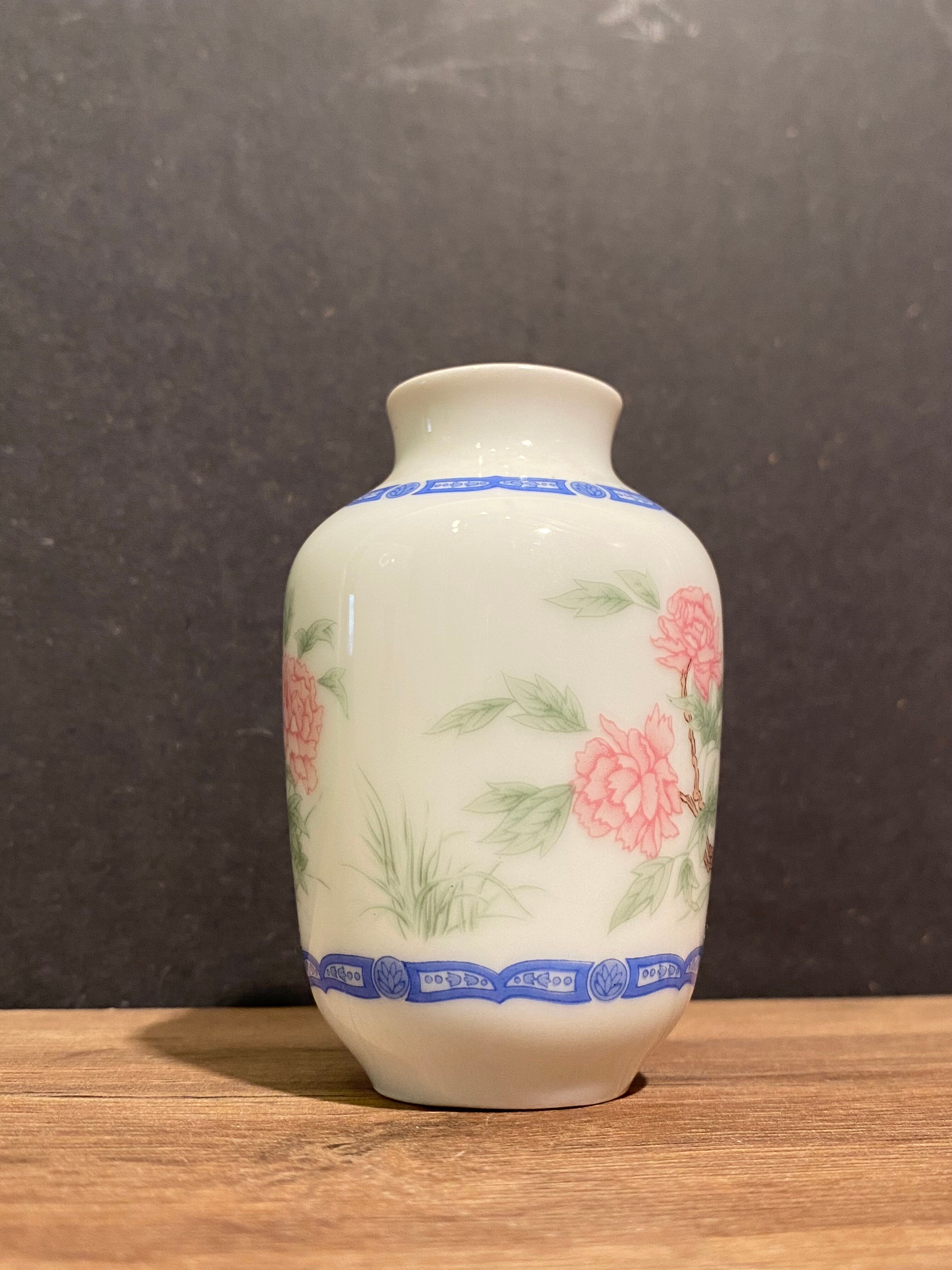 Miniature porcelain vase with floral decoration, Rose family