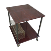 Wooden vintage table on wheels
