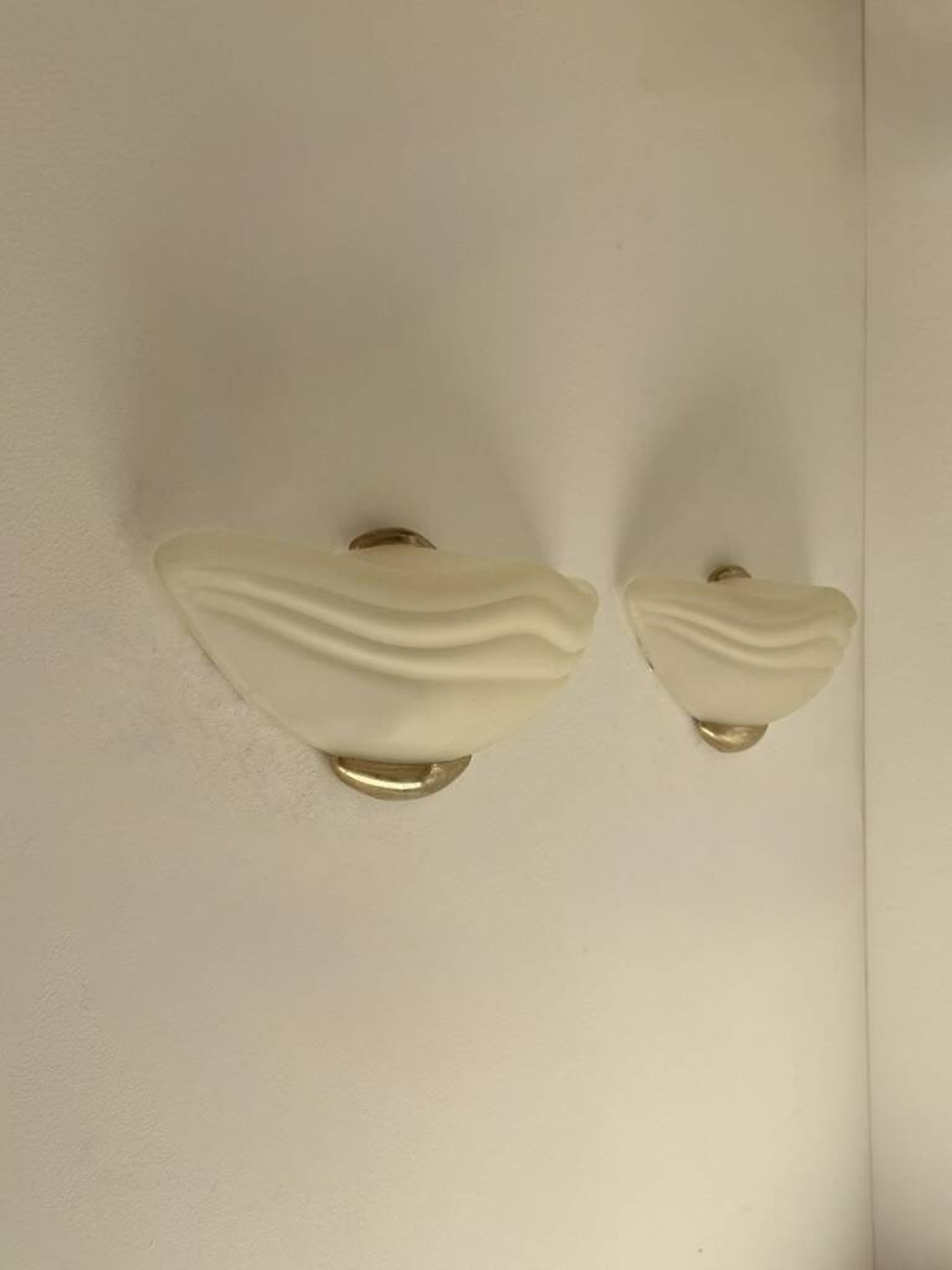 Pair of vintage wall lights in brass and frosted glass, Italy, 1970.