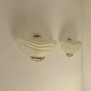 Pair of vintage wall lights in brass and frosted glass, Italy, 1970.