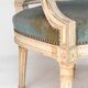 Paire de fauteuils cabriolet de style Louis XVI
