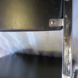 Modernist chair in chromed metal and black imitation leather