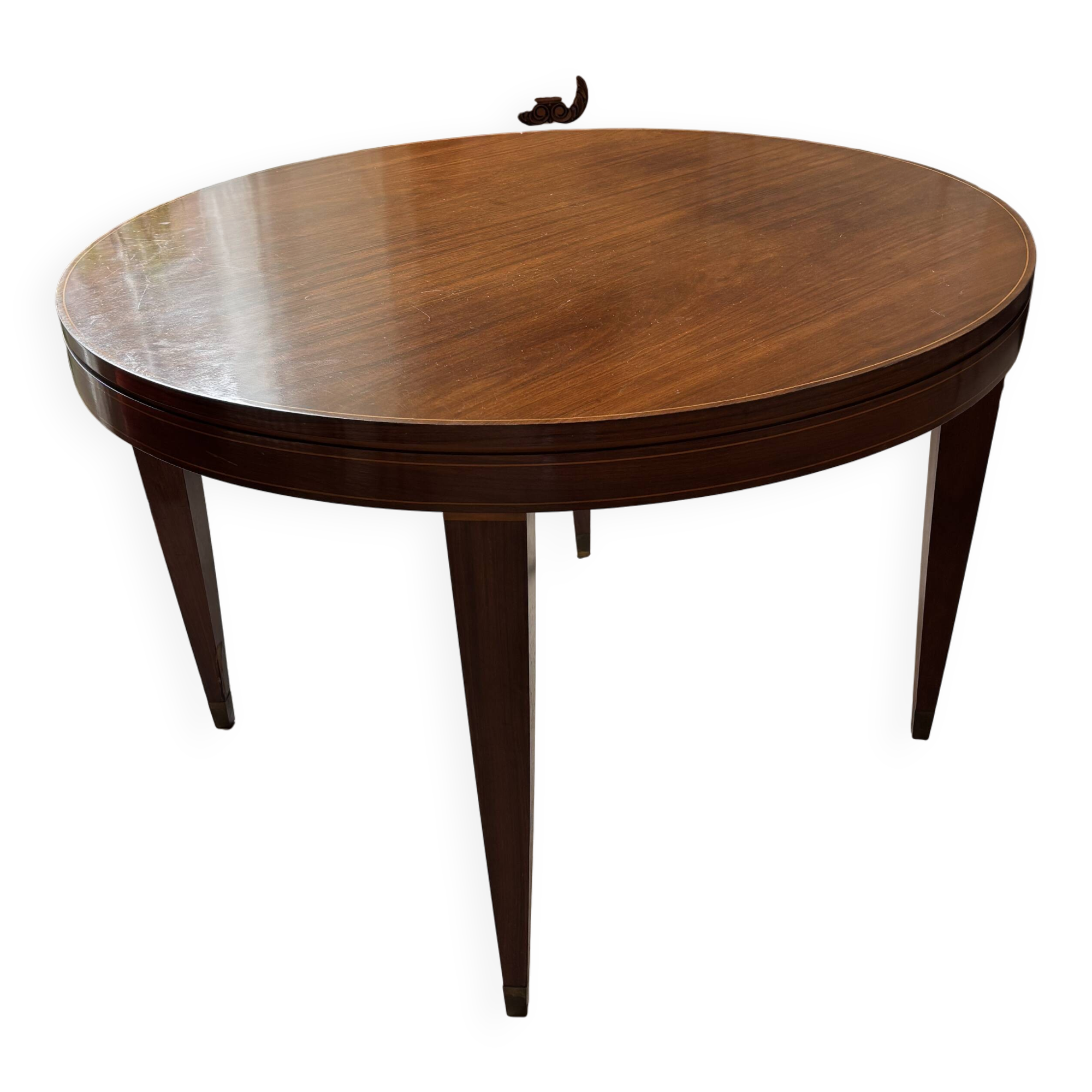 Impeccable 1950s round table in mahogany.