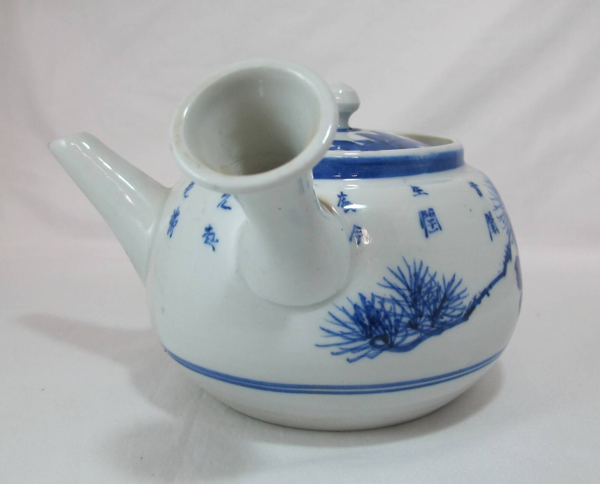 small Chinese or Japanese blue and white porcelain teapot early 20th century