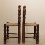 Pair of rustic chairs in turned wood with straw seats