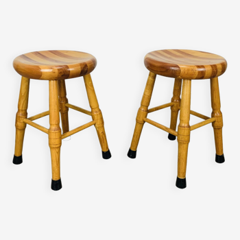 Pair of brutalist solid wood stools