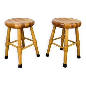 Pair of brutalist solid wood stools