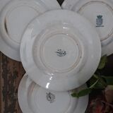 Lot of four mismatched hollow plates